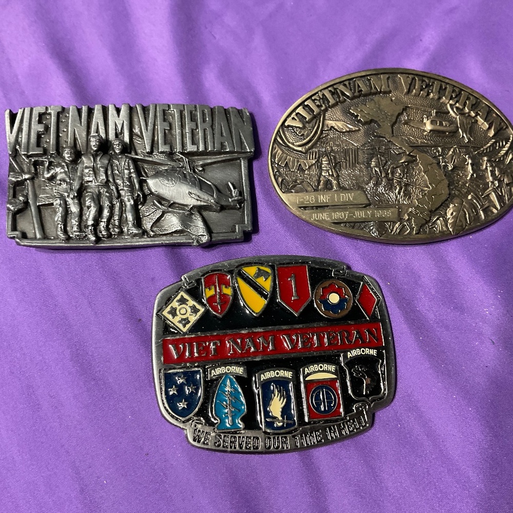 Three Solid brass belt buckles commemorating the Vietnam War. M187